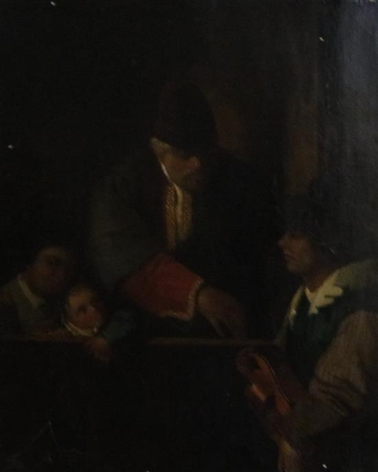 Attributed to Dirck Van Baburen (1570-1624) Hurdy gurdy player entertaining a merchant, 18 x 14.5in.